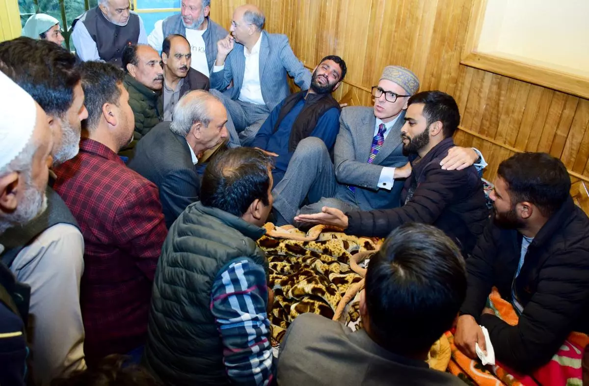 Omar Abdullah offers condolence to the family members of Dr Shanawaz Dar, who was killed in the recent Gagangir terror attack, in Budgam on October 22. Dealing with security challenges will be a major challenge for the new government.