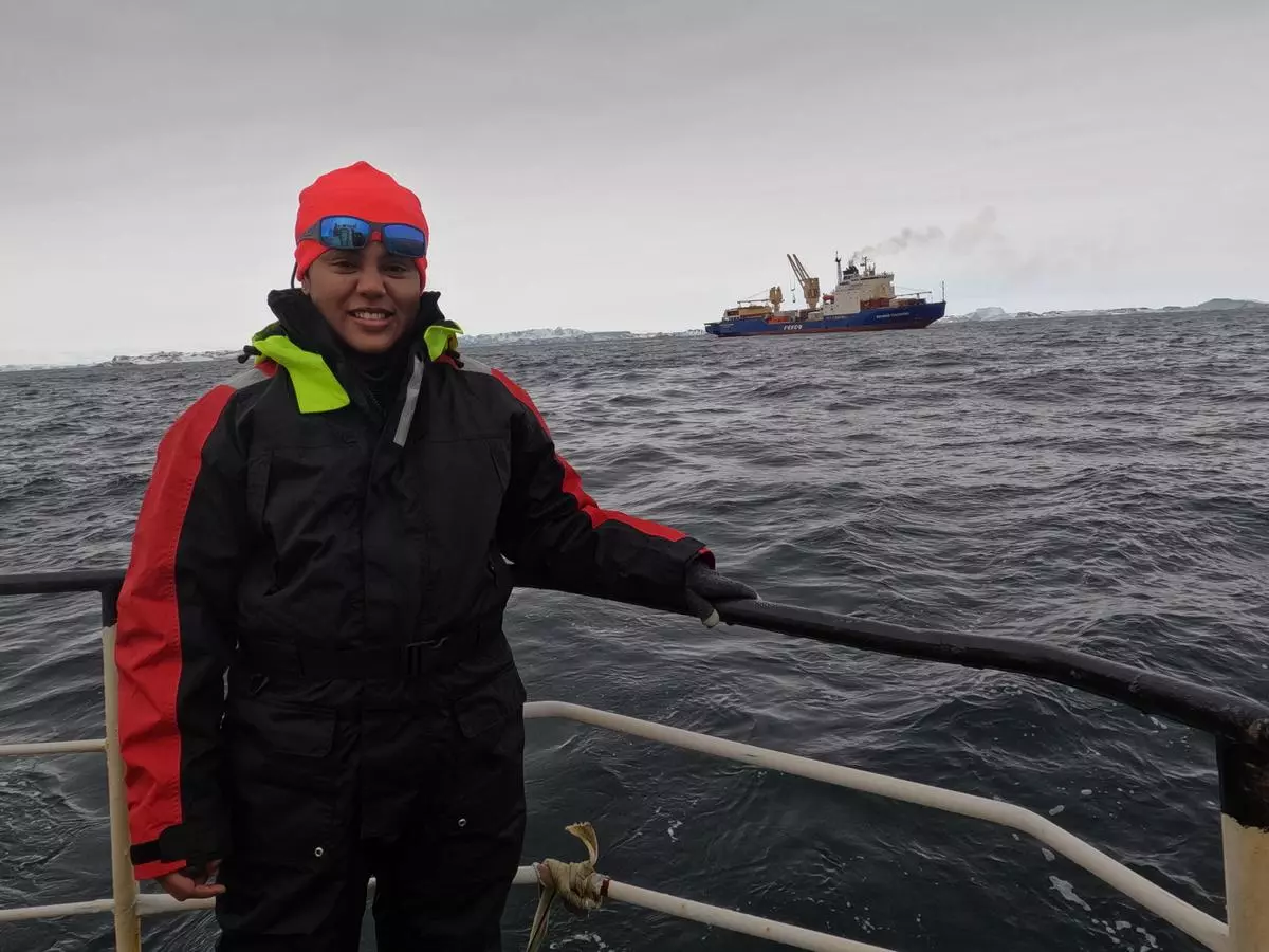 Dr Neeraja Balakrishna on the deck, just off the coast of Antarctica.