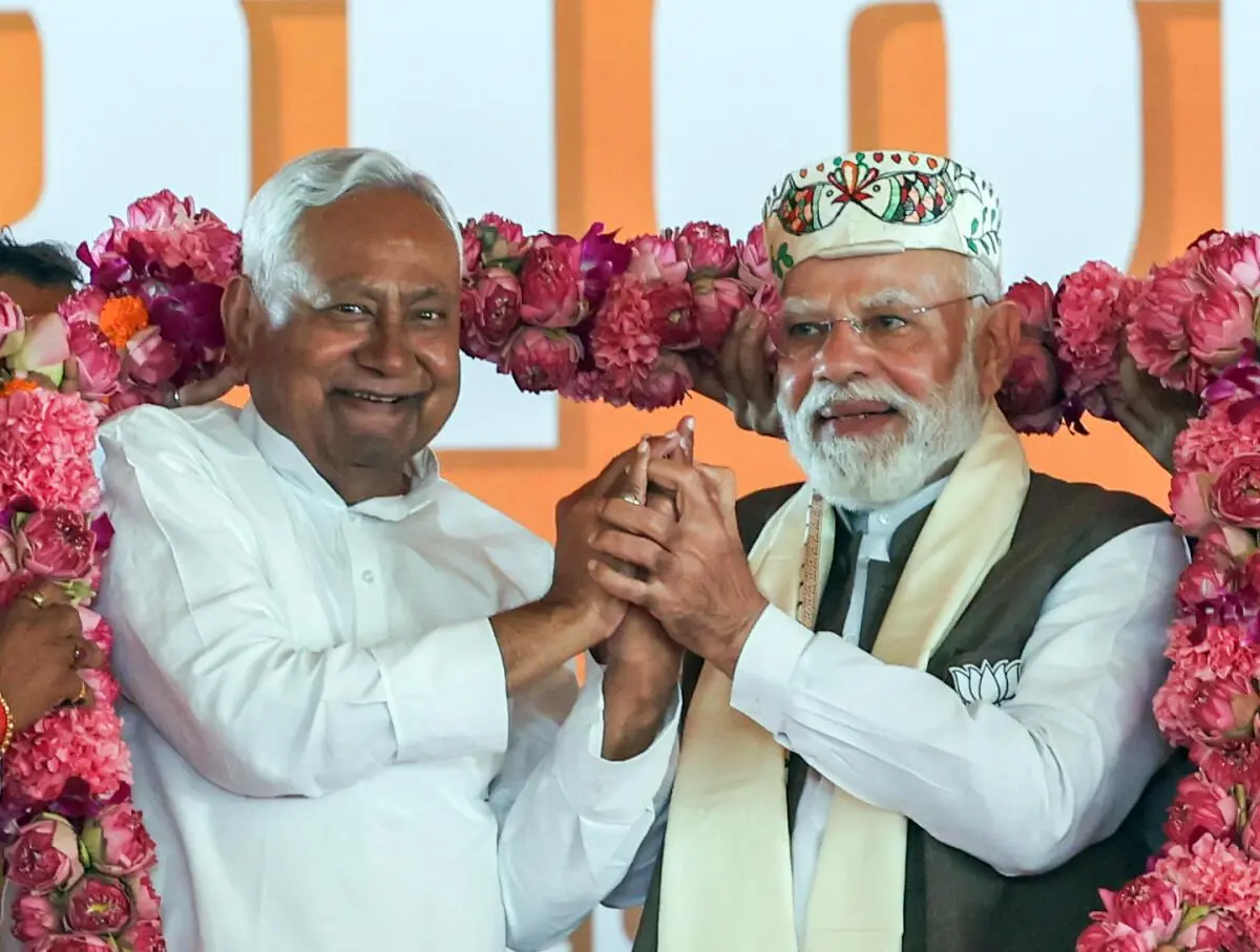 Prime Minister Narendra Modi, along with Bihar Chief Minister Nitish Kumar, being garlanded during a public rally for the Bihar assembly elections, in Samastipur, on October 24, 2025.  Prime Minister Narendra Modi, along with Bihar Chief Minister Nitish Kumar, being garlanded during a public rally for the Bihar assembly elections, in Samastipur, on October 24, 2025.