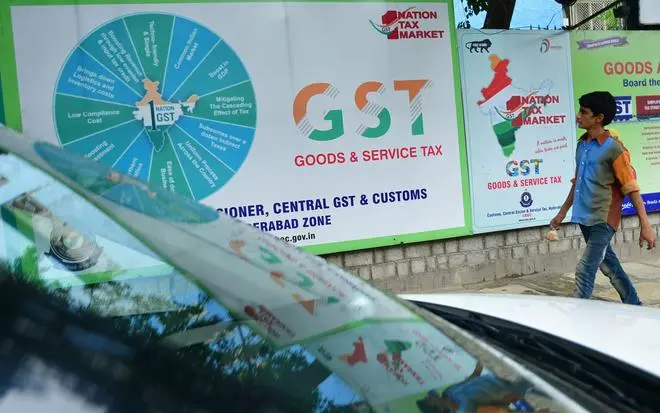 Outside the GST office in Hyderabad in June 2018, a year after the new tax.