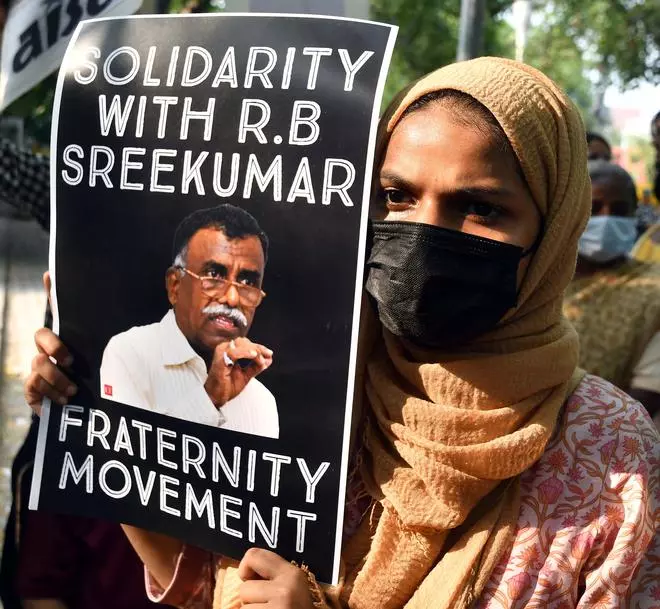 A protester holding placard during a protest against the Central Government over arrest of retired Director General of Police of Gujarat R B Sreekumar, civil right activist and journalist Teesta Setalvad, former IPS officer Sanjiv Bhatt and others at Jantar Mantar, New Delhi, on June 27.