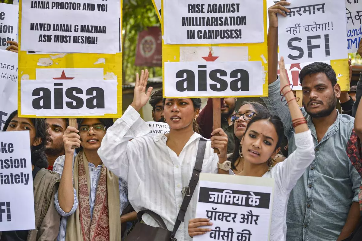 Members of various student organisations along with the suspended students of Jamia Millia Islamia university stage a protest against the Proctor and Vice Chancellor, at Jantar Mantar in New Delhi on February 19, 2025.