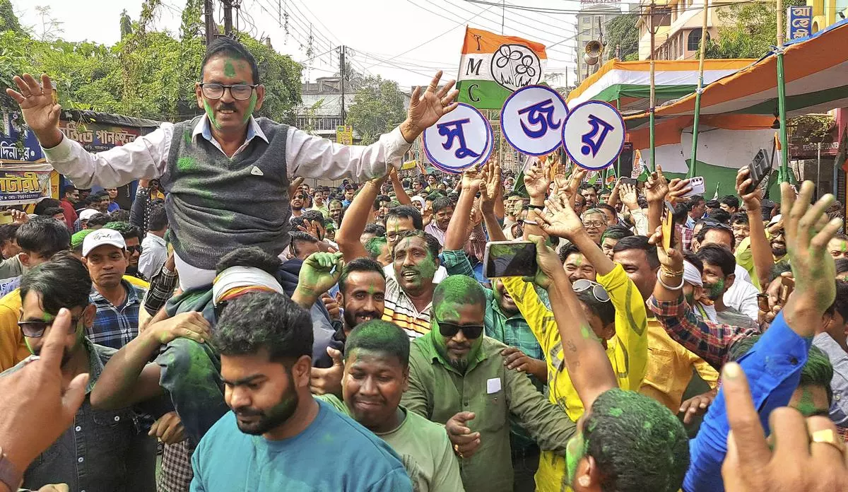 Trinamool Congress supporters celebrate the party candidate Sujoy Hazra’s victory in the Medinipur Sadar Assembly byelection, in West Medinipur on November 23.