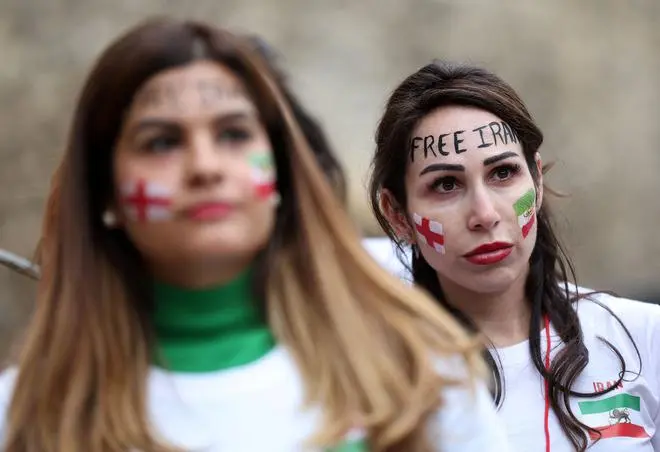 British-Iranian women take part in a demonstration opposite the Houses of Parliament in central London on November 19 ahead of Iran’s fixture against England in the 2022 FIFA World Cup. British-Iranian women take part in a demonstration opposite the Houses of Parliament in central London on November 19 ahead of Iran’s fixture against England in the 2022 FIFA World Cup.