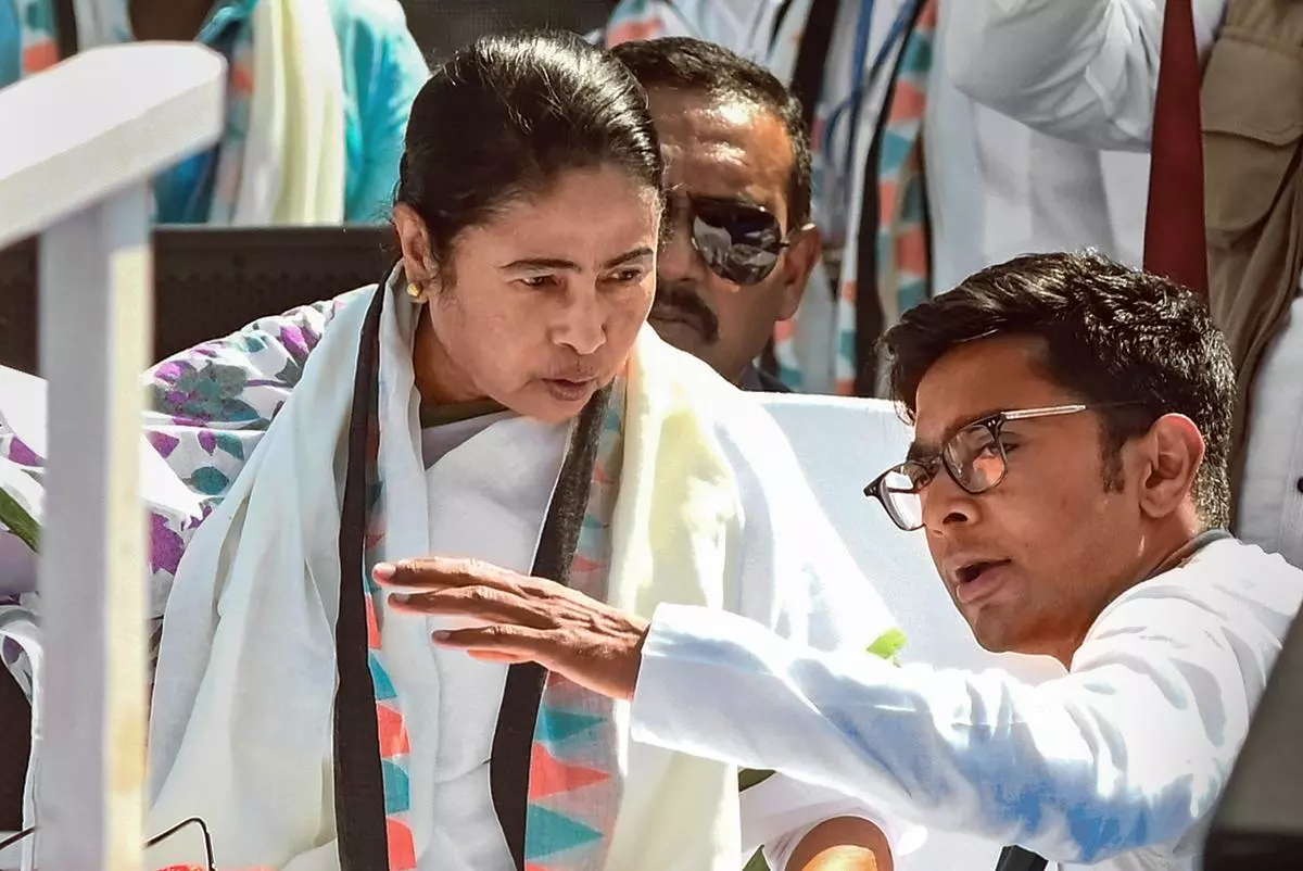 West Bengal Chief Minister and Trinamool Congress supremo Mamata Banerjee with party general secretary Abhishek Banerjee during party’s “Janagarjan Sabha” rally against the Central government, at Brigade Parade Ground, in Kolkata on March 10, 2024. 