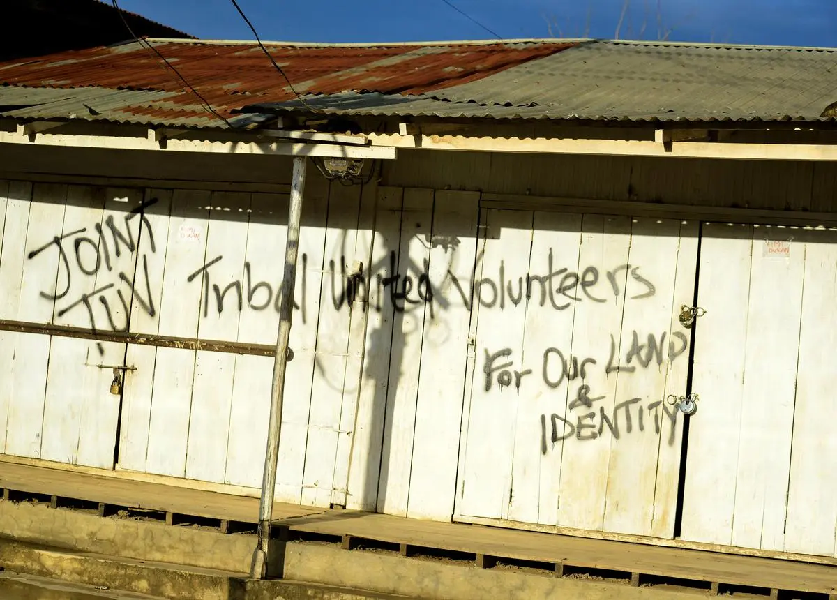 Graffiti by Kukis demanding land rights at Churachandpur district of Manipur on May 17, 2023