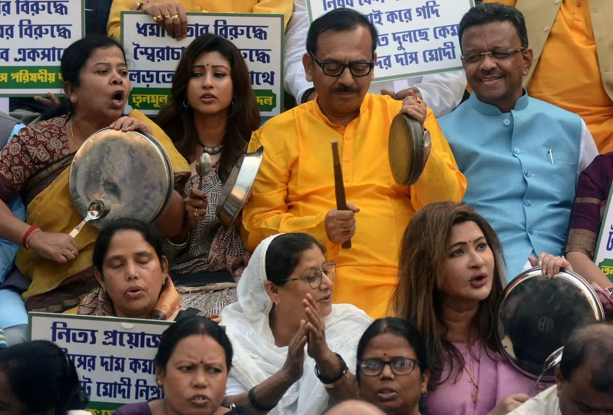 Trinamool Congress MLAs protest in the State Assembly in November 2023 against the denial of funds by the Central government.