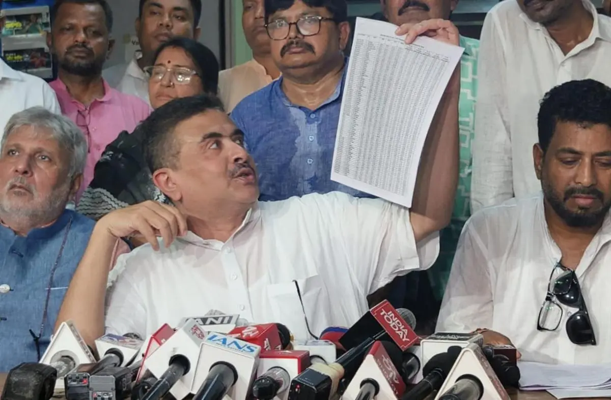 BJP leader Suvendu Adhikari at a press conference outside the Election Commission of India office in Kolkata in July 2025, demanding a Rohingya-free voter list.