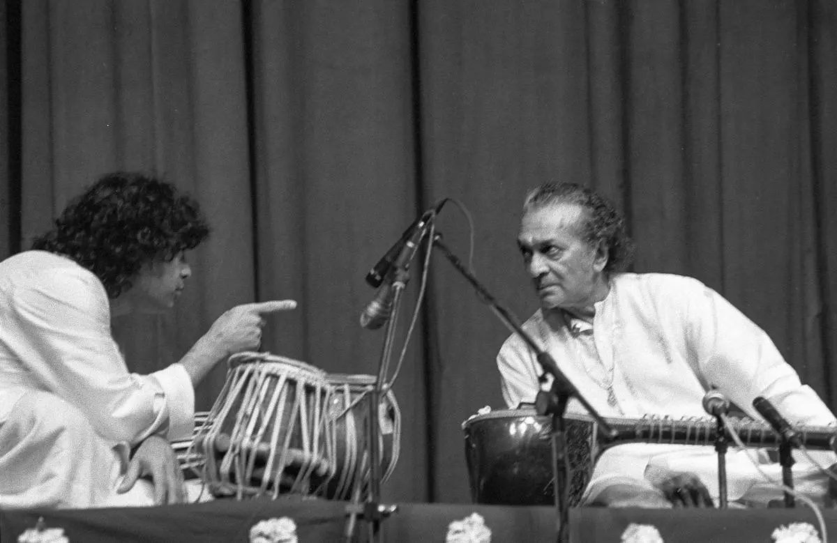 Zakir Hussain performs with sitar maestro Pandit Ravi Shankar in New Delhi. A file photo.