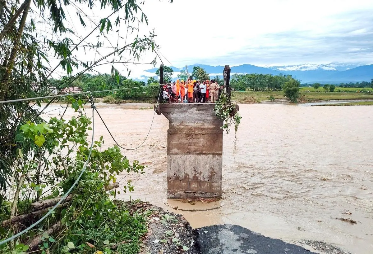 NDRF evacuate people through a zip line during a Flood Water Rescue operation in flood-affected areas, in Jalpaiguri on October 5, 2025.