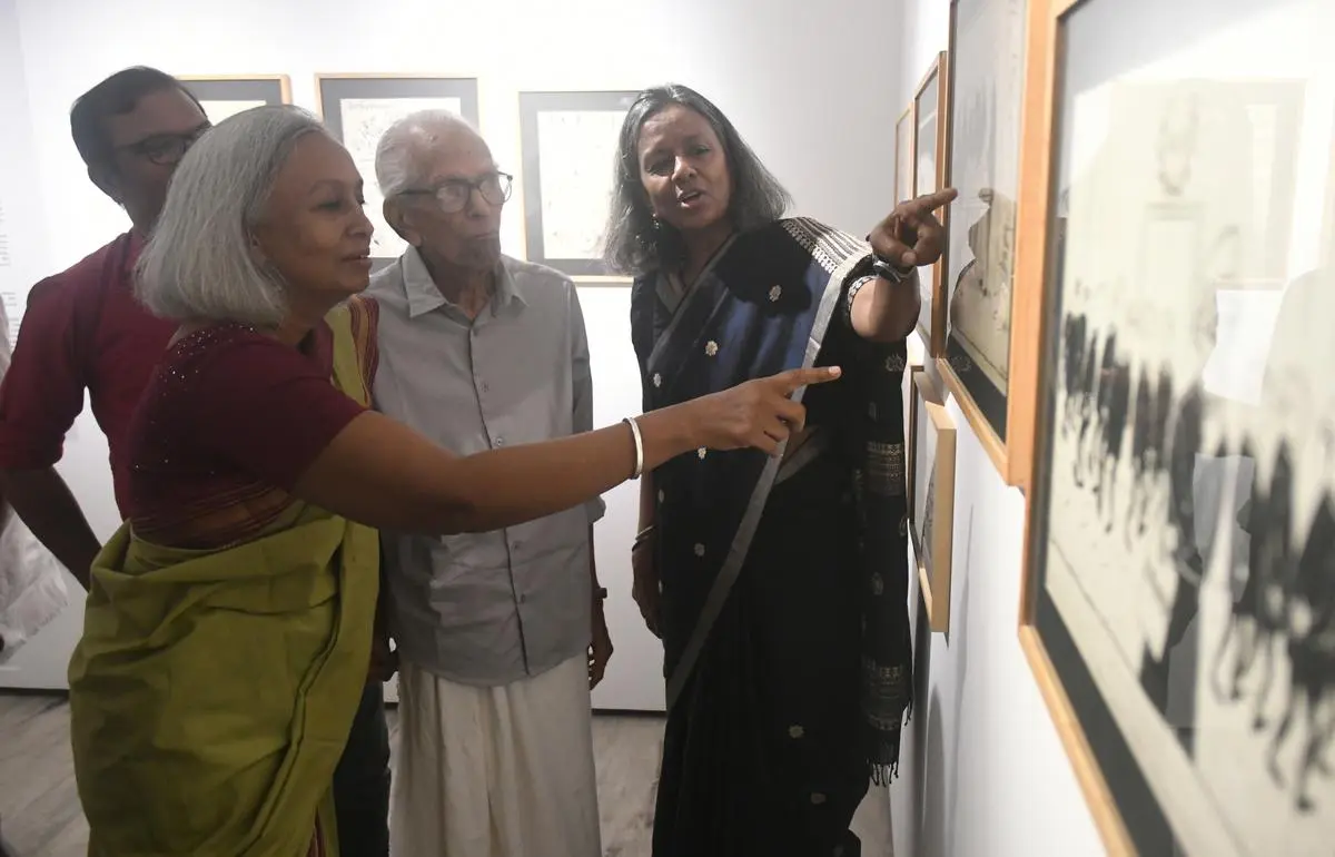 Abu Abraham’s daughters Ayisha and Janaki with the critic M.K. Sanoo who inaugurated the exhibition on March 22 at Durbar Hall, Kochi.