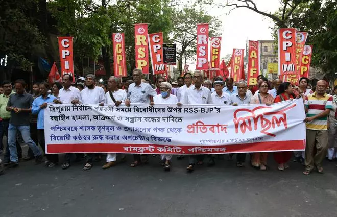 Left Front chairman Biman Bose leads a rally protesting the results of the Tripura election in Kolkata March 9. 