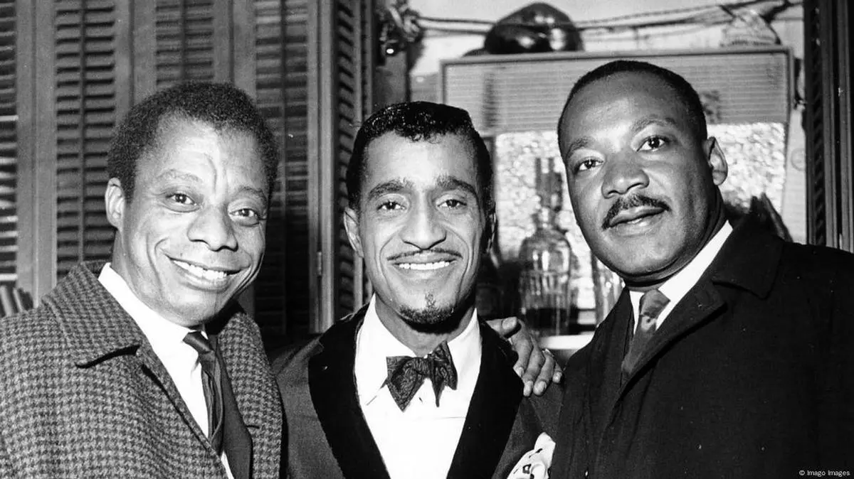 James Baldwin (left) with singer Sammy Davis Jr. and US civil rights activist Dr. Martin Luther King Jr.(right)