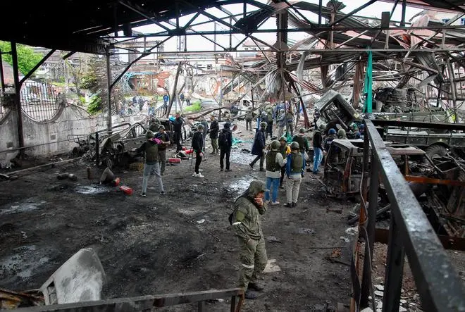 International journalists at the site of Illich Iron & Steel Works plant in Mariupol used by Ukrainian troops as a fighting position. International journalists at the site of Illich Iron & Steel Works plant in Mariupol used by Ukrainian troops as a fighting position.