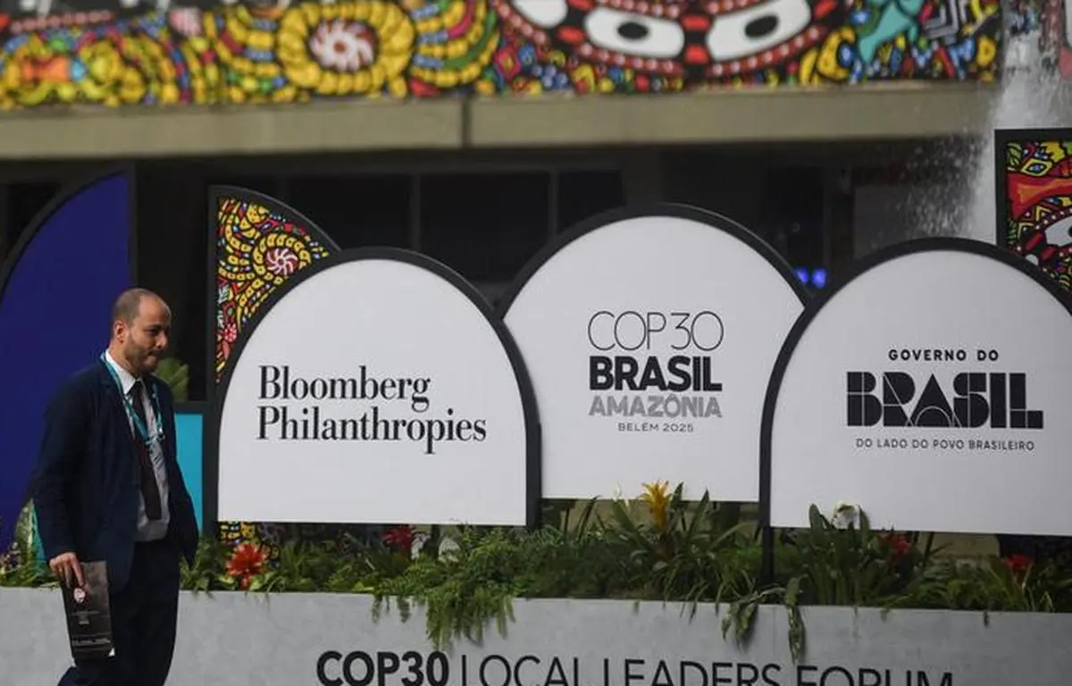 People walk during the COP 30 Local Leaders Forum at the Museum of Modern Art in Rio de Janeiro, Brazil, November 4, 2025. As rich nations backtrack on commitments, the global South continues to innovate quietly—without the fanfare of reversing billionaires.