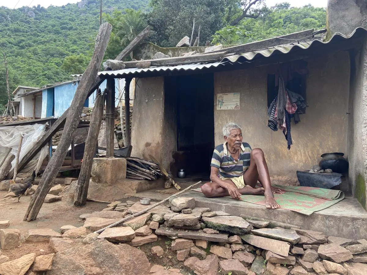  Torang Bhuiyan, sitting outside his home at Baraghara.