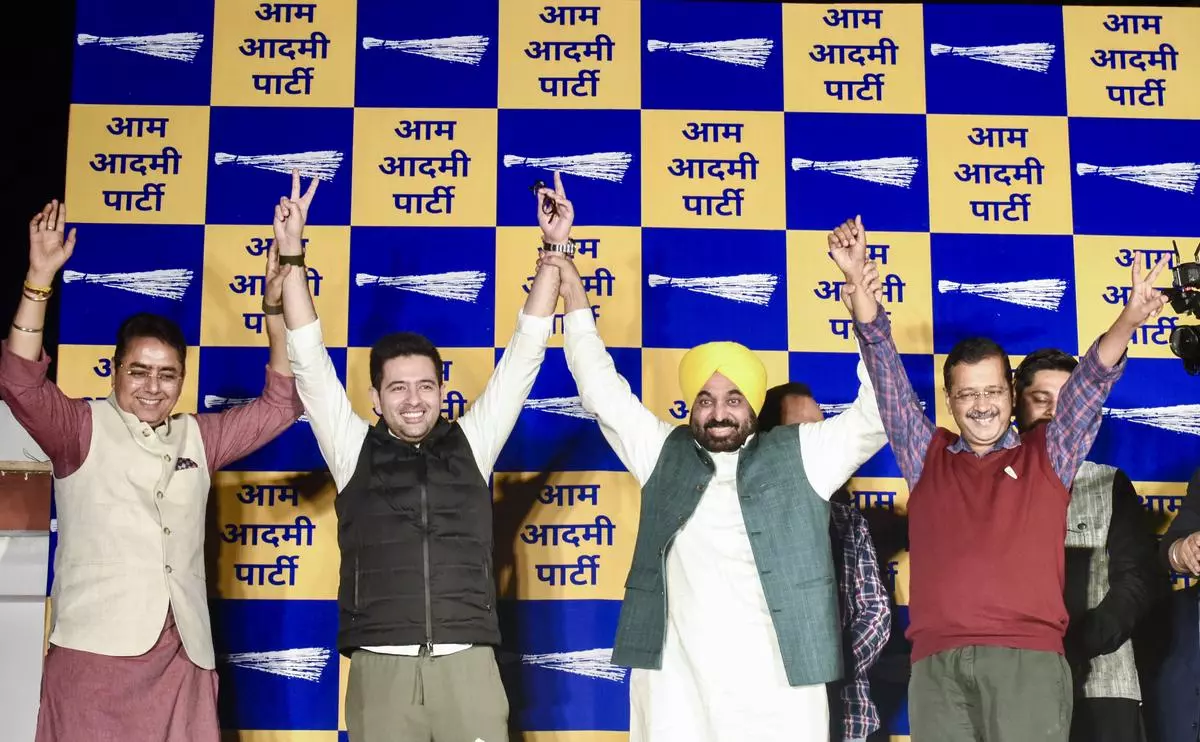 Aam Aadmi Party National Convenor Arvind Kejriwal, Punjab Chief Minister Bhagwat Maan, party leaders Raghav Chadha, and others celebrate the party’s win in the Punjab Assembly byelections, in New Delhi on November 23.