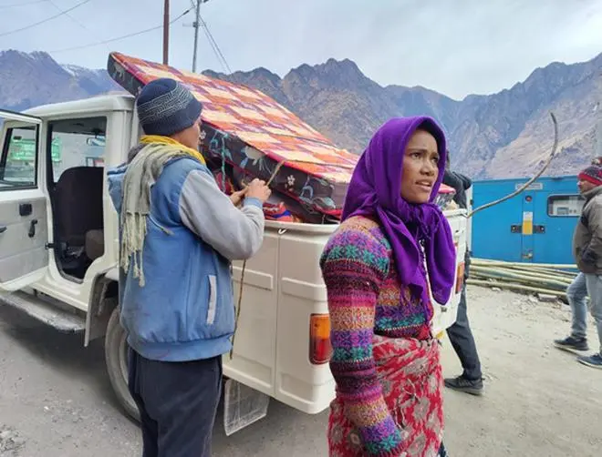 Residents of Joshimath packing up their lives and leaving town. Residents of Joshimath packing up their lives and leaving town.