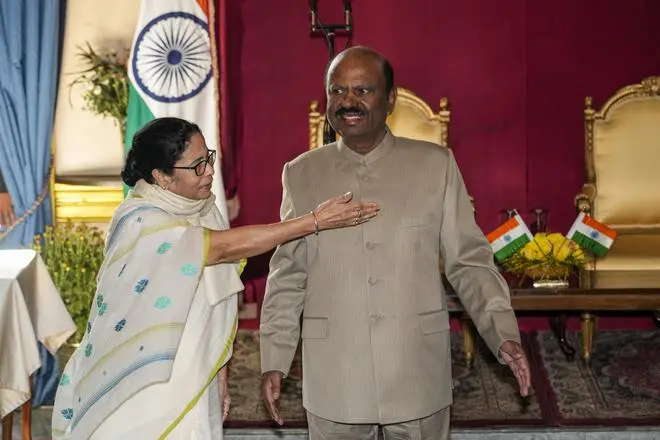 Chief Minister of West Bengal Mamata Banerjee and Governor C. V. Ananda Bose after he took the oath of office, in Kolkata on November 23. Chief Minister of West Bengal Mamata Banerjee and Governor C. V. Ananda Bose after he took the oath of office, in Kolkata on November 23.