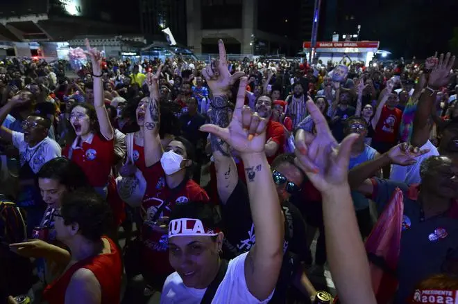 Supporters of Luiz Inacio Lula da Silva cheer for him on presidential runoff day in Sao Paulo, Brazil, on October 30. Supporters of Luiz Inacio Lula da Silva cheer for him on presidential runoff day in Sao Paulo, Brazil, on October 30.