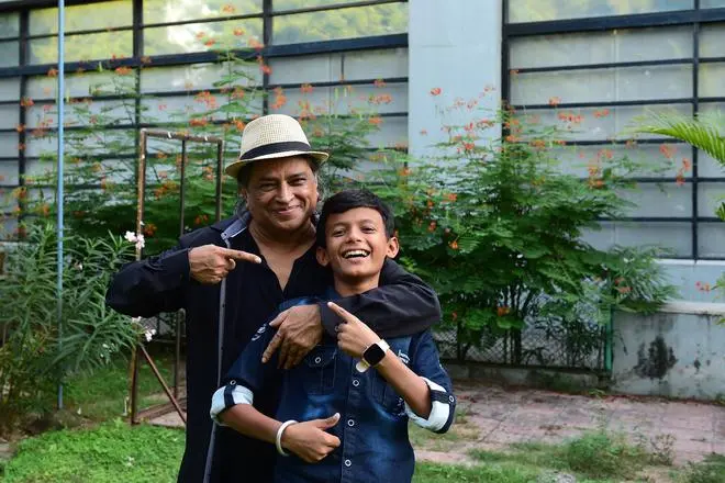 Bhavin Rabari, the lead actor of Chhello Show, and Pan Nalin, the film’s director, pose for pictures at an event in Ahmedabad on October 14. Bhavin Rabari, the lead actor of Chhello Show, and Pan Nalin, the film’s director, pose for pictures at an event in Ahmedabad on October 14.