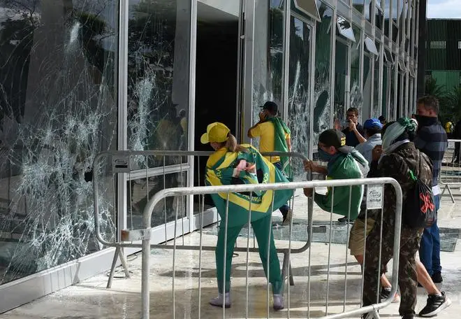 The protesters vandalise the Supreme Court in Brasilia. The protesters vandalise the Supreme Court in Brasilia.