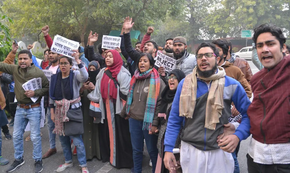 Students during a protest demonstration against the CAA in 2019. Amid anti-CAA protests, students turned to Faiz’s Hum Dekhenge as a rallying cry, invoking a legacy of poetic dissent that unsettles state power and reclaims secular resistance from communal misreadings.