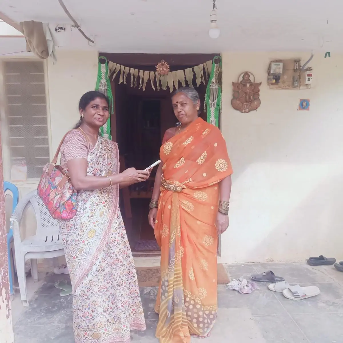 An enumerator collecting data on a hand-held device to record the empirical data on subcaste demographics, in a Bengaluru neighbourhood on May 5, 2025, as Karnataka begins a Statewide Caste Census for SCs. An enumerator collecting data on a hand-held device to record the empirical data on subcaste demographics, in a Bengaluru neighbourhood on May 5, 2025, as Karnataka begins a Statewide Caste Census for SCs.