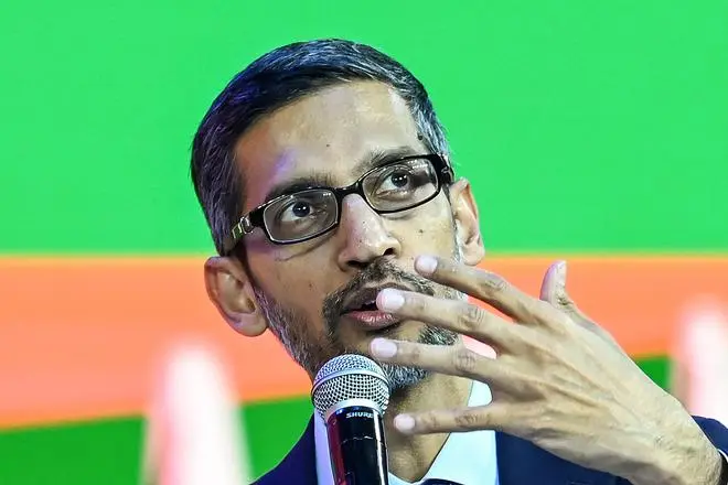 Sundar Pichai, CEO of Google Inc., speaks during an event in New Delhi on December 19, 2022. Sundar Pichai, CEO of Google Inc., speaks during an event in New Delhi on December 19, 2022.