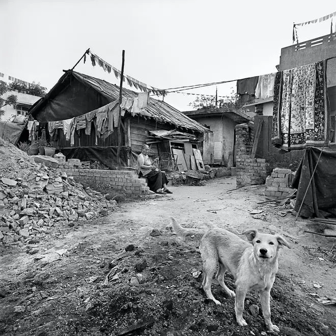 An elderly woman saying her evening prayers in Majnu ka Tilla. A 2011 photograph. An elderly woman saying her evening prayers in Majnu ka Tilla. A 2011 photograph.