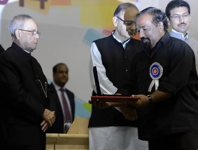 President Pranab Mukherjee presenting the 62nd National Film special jury award (Non-Feature Films) to Joshy Joseph in May 2015. President Pranab Mukherjee presenting the 62nd National Film special jury award (Non-Feature Films) to Joshy Joseph in May 2015.
