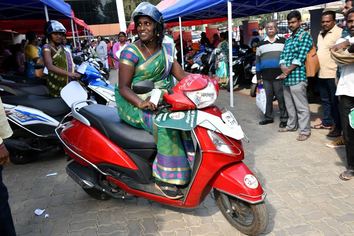 Jayalalithaa introduced schemes aimed at women like free mixer-grinders and 50 per cent subsidy for buying mopeds. In picture, a beneficiary with a moped given by the State government. 