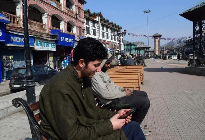 On internet shutdowns, a Parliamentary Standing Committee report notes that India is number one globally, and the country has lost billions of dollars annually due to such shutdowns. People using cellphones in Srinagar, a file picture.&nbsp;