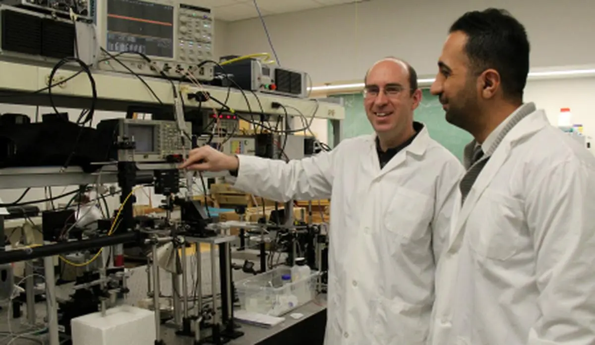 Roger Zemp and Parsin Hajireza with their equipment that is capable of early detection of cancer in growing tumours using acoustic waves. 