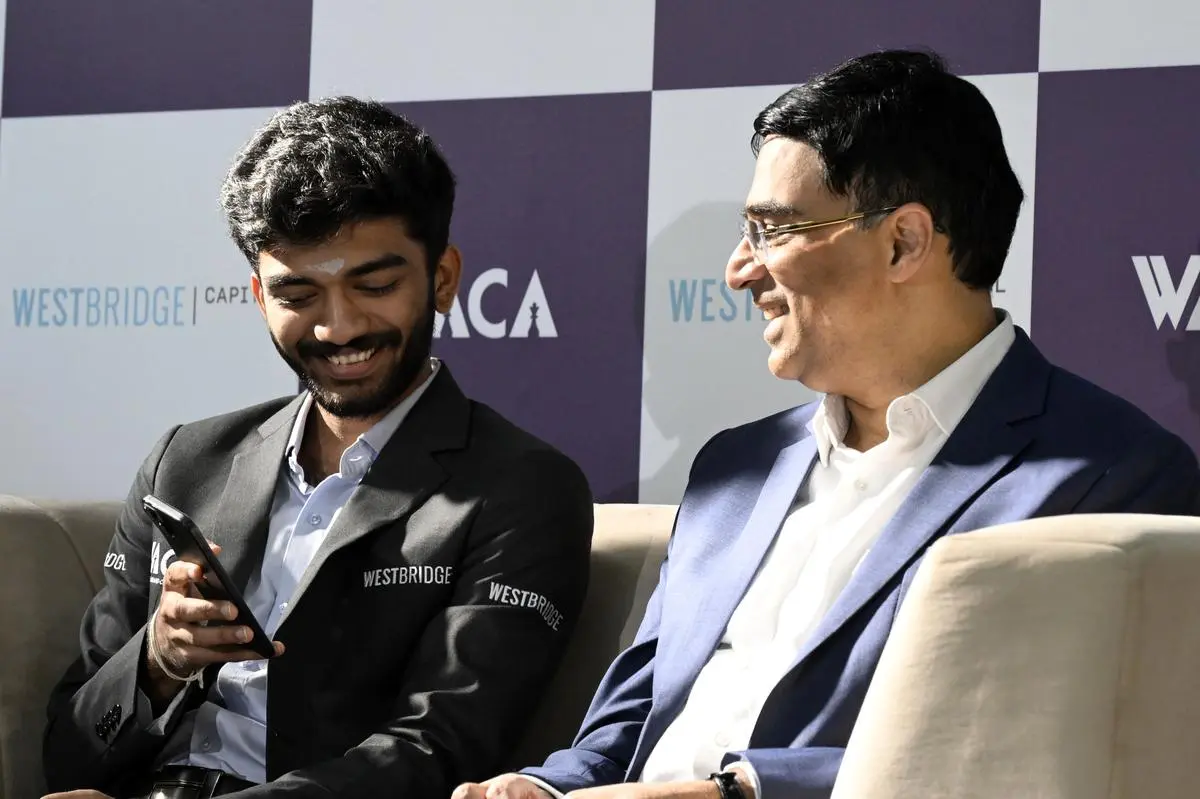 World Chess Champion Gukesh Dommaraju and Indian chess Grandmaster Viswanathan Anand celebrate Gukesh’s remarkable victory at the World Chess Championship in Bengaluru, on January 5, 2025. World Chess Champion Gukesh Dommaraju and Indian chess Grandmaster Viswanathan Anand celebrate Gukesh’s remarkable victory at the World Chess Championship in Bengaluru, on January 5, 2025.