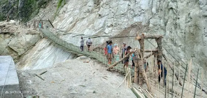 Ropeway strung by villagers across a damaged portion of the Trans-Arunachal Highway at Lelek in Siang district in July 2021. Ropeway strung by villagers across a damaged portion of the Trans-Arunachal Highway at Lelek in Siang district in July 2021.