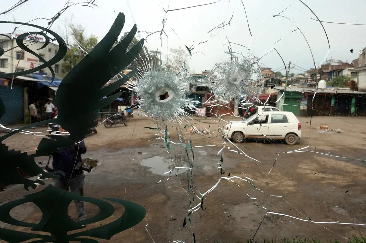 Through the windshield of a bus damaged by cross-border shelling between India and Pakistan, in Poonch on May 9, 2025. Through the windshield of a bus damaged by cross-border shelling between India and Pakistan, in Poonch on May 9, 2025.