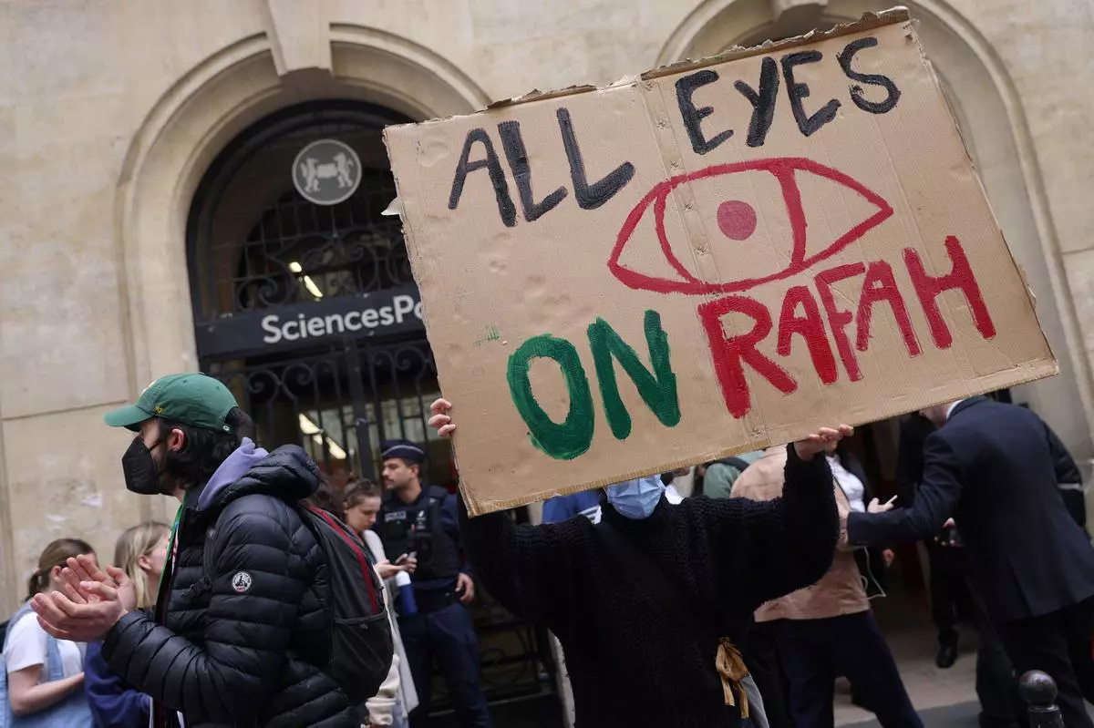 Students occupy the street in front of the Sciences Po University in Paris, building in support of Palestinians in Gaza, amid the ongoing conflict between Israel and Hamas on May 7, 2024. 