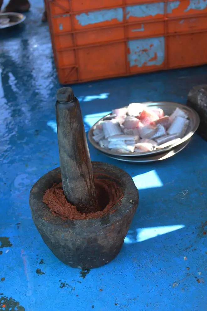 Master chef spices are being ground to marinate the fish, which along with steamed rice is the staple meal for the entire month at sea. Master chef spices are being ground to marinate the fish, which along with steamed rice is the staple meal for the entire month at sea.