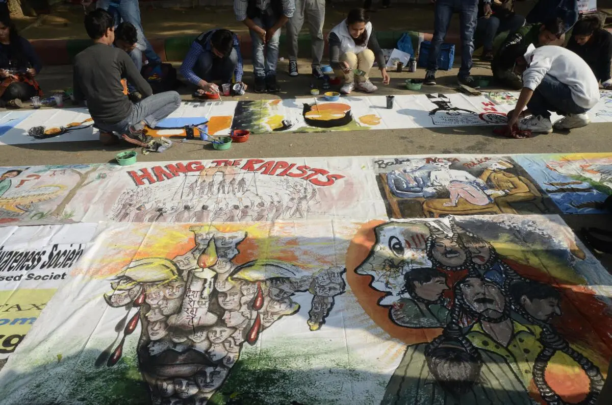 Protest posters being painted in the wake of the Nirbhaya case, in New Delhi on December 16, 2014.