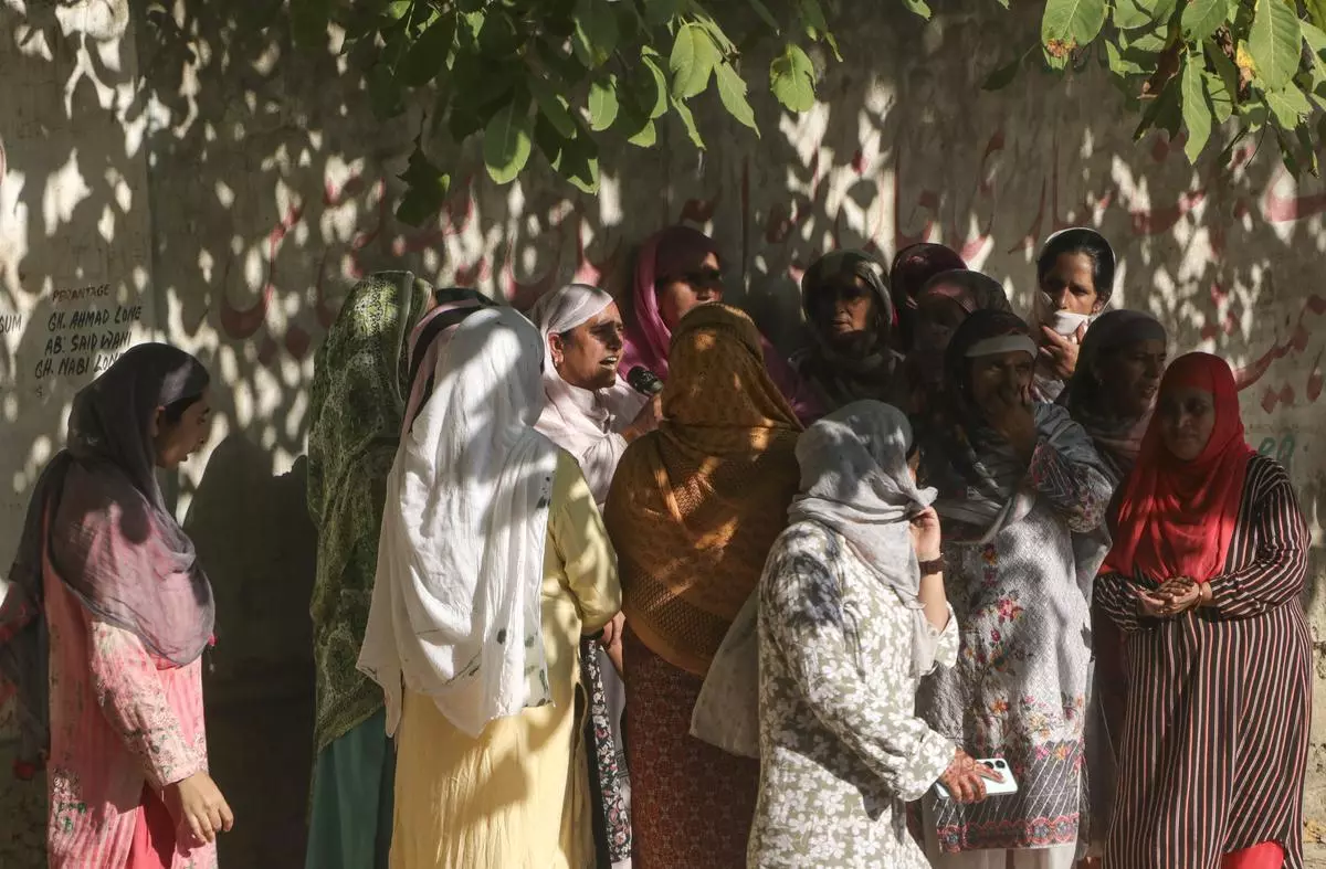 Kashmiri women sing a traditional song for JKNC during a rally in Tangmarg on September 19, 2024.