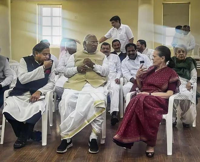 New party president president Mallikarjun Kharge sits with Sonia Gandhi, Shashi Tharoor, whom he beat by an impressive margin, and other Congress leaders in New Delhi on October 26 when he formally took charge. New party president president Mallikarjun Kharge sits with Sonia Gandhi, Shashi Tharoor, whom he beat by an impressive margin, and other Congress leaders in New Delhi on October 26 when he formally took charge.