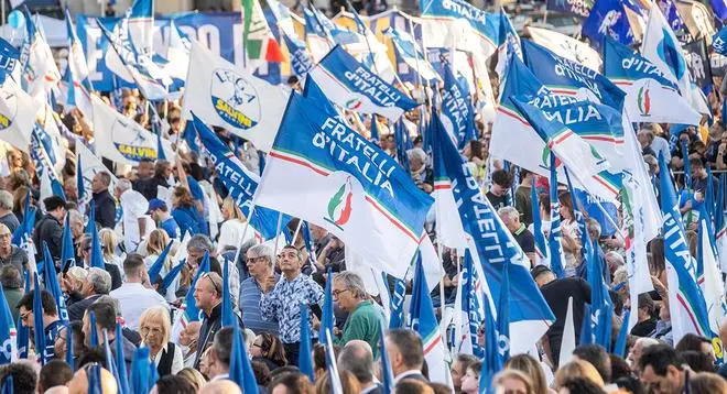 Supporters of Brothers of Italy party at rally in Rome on September 22. Supporters of Brothers of Italy party at rally in Rome on September 22.