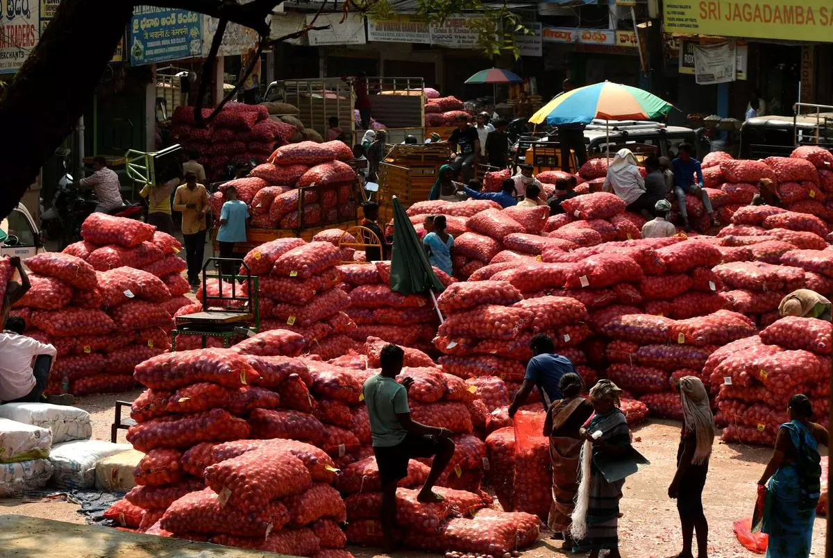 Stocks of onion from Maharashtra arrive in Malakpet, Hyderabad on March 11, 2023. Maharashtra contributes more than 40 per cent to the total onion production in India.