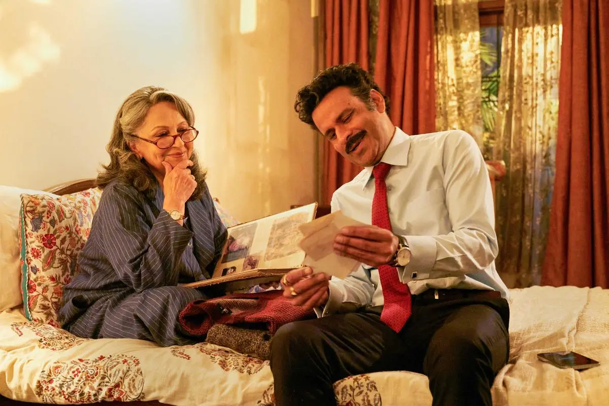 **EDS: TO GO WITH STORY** Mumbai: Bollywood actors Sharmila Tagore and Manoj Bajpayee in a still from the upcoming film 'Gulmohar'. (PTI Photo)(PTI02_17_2023_000149B)