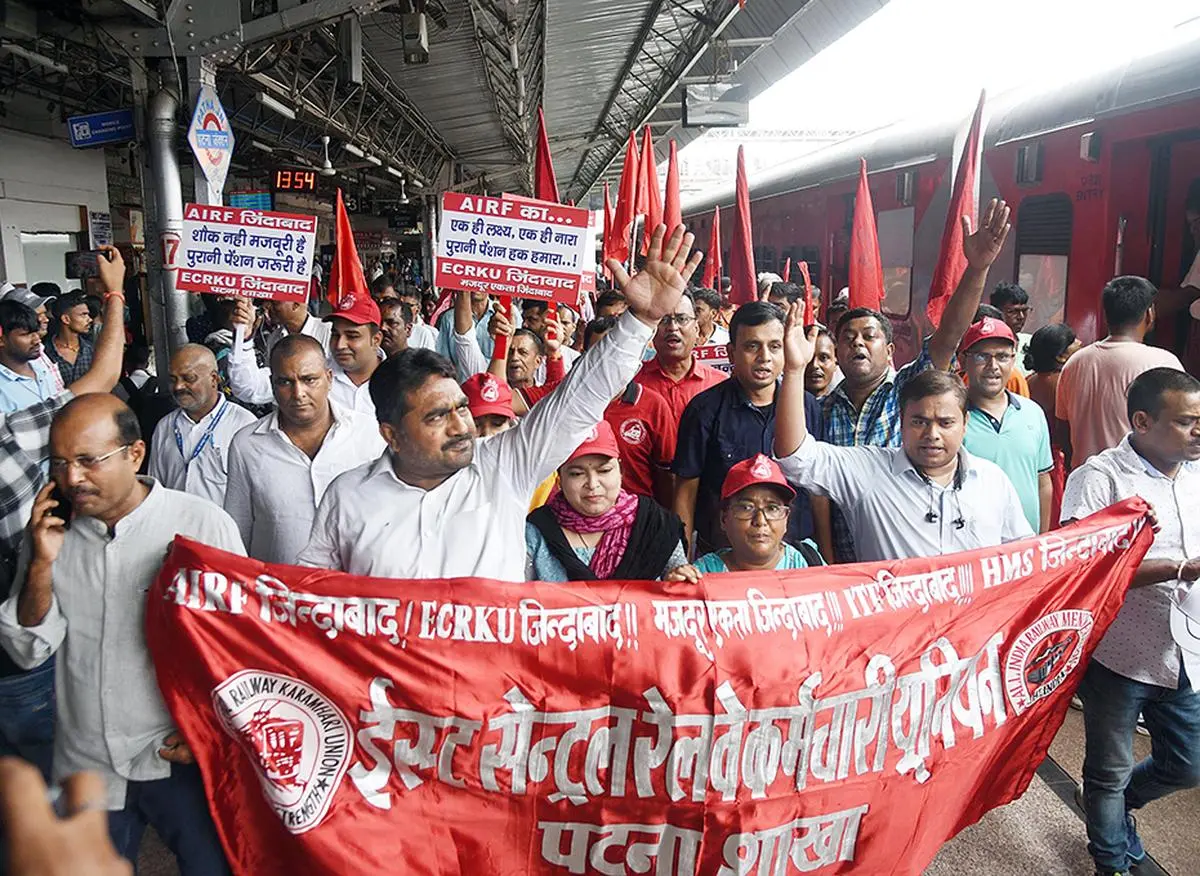 East Central Railway Karmachari Union members under the banner of All India Railwaymen’s Federation protesting for the restoration of the Old Pension Scheme (OPS), in Patna on July 12. Unlike the OPS, there was no provision for a minimum assured pension under the New Pension Scheme which became a contentious issue. East Central Railway Karmachari Union members under the banner of All India Railwaymen’s Federation protesting for the restoration of the Old Pension Scheme (OPS), in Patna on July 12. Unlike the OPS, there was no provision for a minimum assured pension under the New Pension Scheme which became a contentious issue.