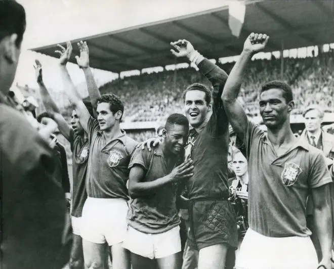 JUST 17, he weeps on the shoulder of goalkeeper Gylmar Dos Santos Neves after Brazil’s 5-2 victory over Sweden in the final of the 1958 World Cup in Stockholm, on June 29. JUST 17, he weeps on the shoulder of goalkeeper Gylmar Dos Santos Neves after Brazil’s 5-2 victory over Sweden in the final of the 1958 World Cup in Stockholm, on June 29.