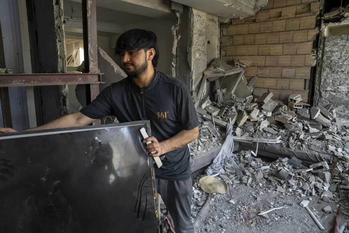 A man person assesses the destruction of a residential property on June 29, 2025, in northern Tehran, Iran, after it was hit during an Israeli airstrike. A man person assesses the destruction of a residential property on June 29, 2025, in northern Tehran, Iran, after it was hit during an Israeli airstrike.