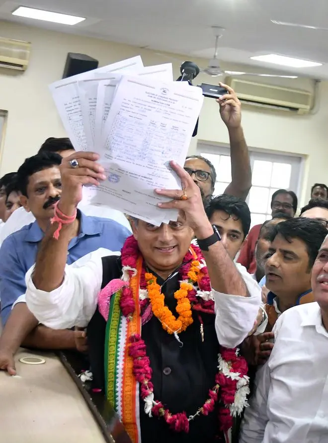 Shashi Tharoor filing the nomination papers at AICC in Delhi on September 30. Shashi Tharoor filing the nomination papers at AICC in Delhi on September 30.
