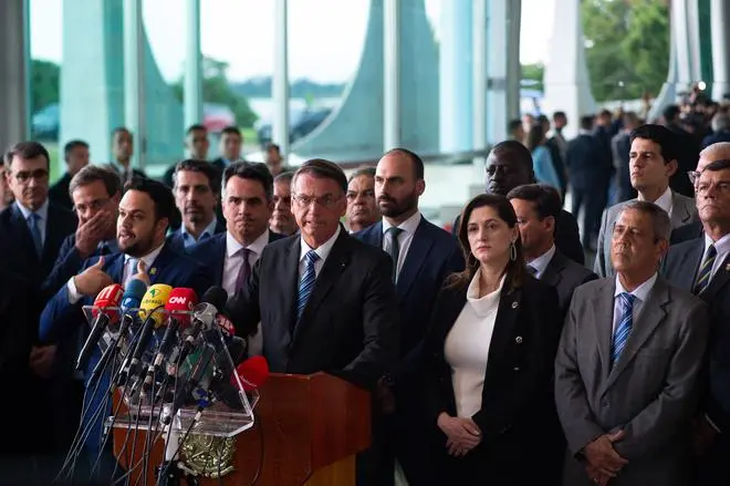 President of Brazil Jair Bolsonaro speaks during a press conference two days after being defeated by Lula da Silva in the presidential runoff at Alvorada Palace in Brasilia on November 1. Bolsonaro didn’t acknowledge his defeat and asked supporters to protest in a pacific way and allowing free transit through the country. President of Brazil Jair Bolsonaro speaks during a press conference two days after being defeated by Lula da Silva in the presidential runoff at Alvorada Palace in Brasilia on November 1. Bolsonaro didn’t acknowledge his defeat and asked supporters to protest in a pacific way and allowing free transit through the country.